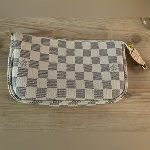 Super cute! Never used Beautiful Azur pochette style pouch with strap